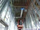 Installing ductwork fitters at the 3rd floor Facing West.jpg